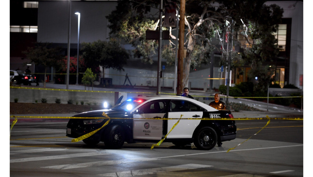 Man takes officer’s gun, opens fire inside LA police station