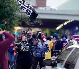 Breonna Taylor protests continue as Louisville under curfew